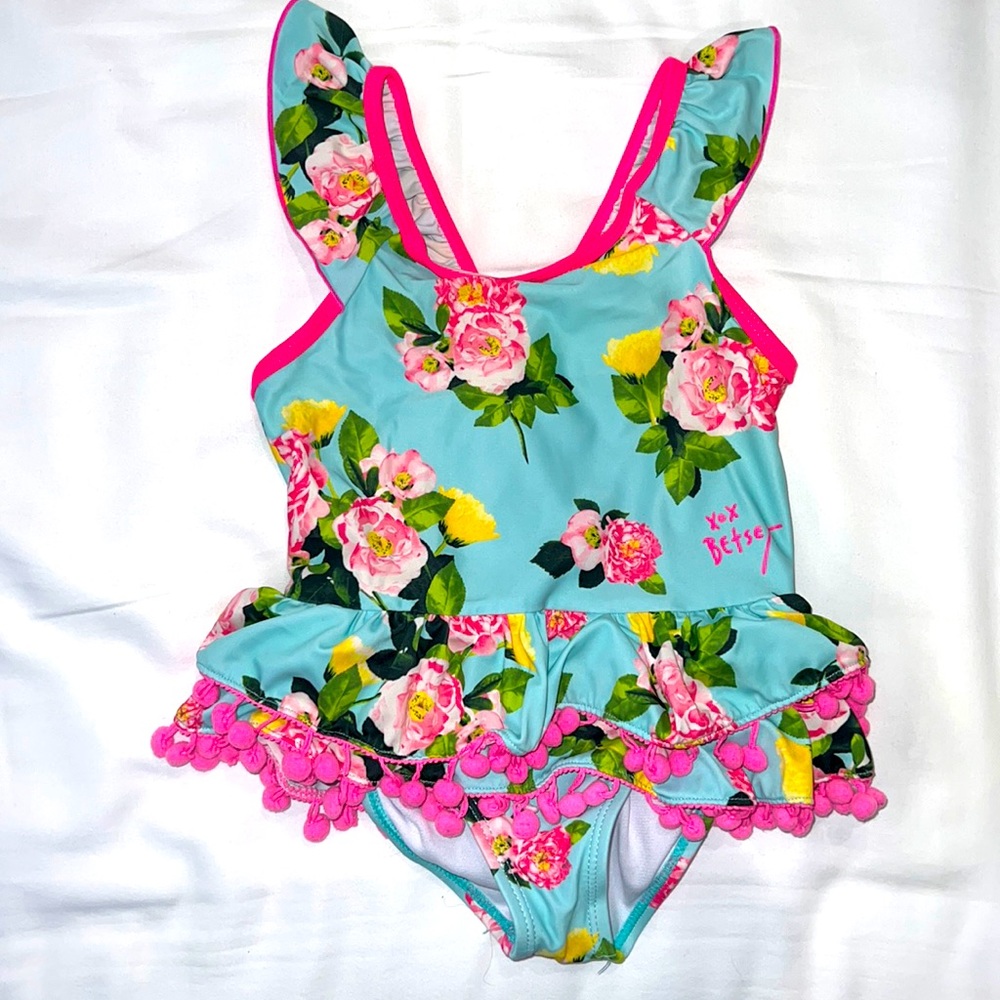 Girls size 5T floral and hot pink bathing suit with ruffles and dangling PomPoms